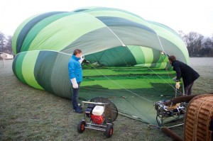 Allan Torp and Rune Paamand help prepare the balloon for takeoff. 
