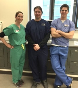 Cook Surgery district managers Lisa (left) and Dan (right) with Cook Vascular engineer Jeffrey Painter (center) at the University of Chicago.